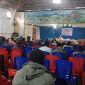 Kadispora Deiyai, Tino Mote, saat menyampaikan sambutan dalam rapat sinkronisasi kepemudaan di Aula Katolik Waghete II, Selasa (1/7/2025).