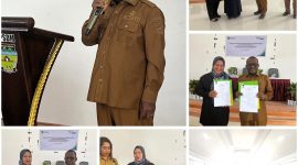 Bupati Deiyai, Melkianus Mote (tengah), didampingi oleh Kepala BPJS Ketenagakerjaan Cabang Nabire, Mustika (kanan), saat acara Sosialisasi Program Jaminan Sosial dan penandatanganan kerja sama antara Pemkab Deiyai dan BPJS Ketenagakerjaan.