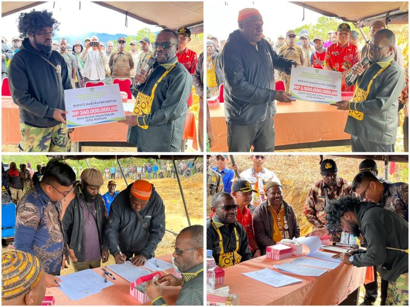 Bupati Deiyai menyerahkan amplop berisi pembayaran tunai kepada perwakilan pemilik lahan atau komunitas sopir, di dampingi pejabat terkait