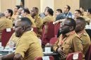 Bupati Deiyai, Melkianus Mote, didampingi Sekda Deiyai Ambrosius Eria saat menghadiri Forum Koordinasi Strategi Percepatan Pembangunan Papua di Timika, Kabupaten Mimika, bersama para kepala daerah se-Tanah Papua.