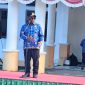 Bupati Deiyai Melkianus Mote, S.T., menyampaikan arahan saat Apel Gabungan Korpri, ASN, CPNS, dan tenaga kontrak di halaman Kantor Bupati Deiyai, Rabu (17/6/2026).